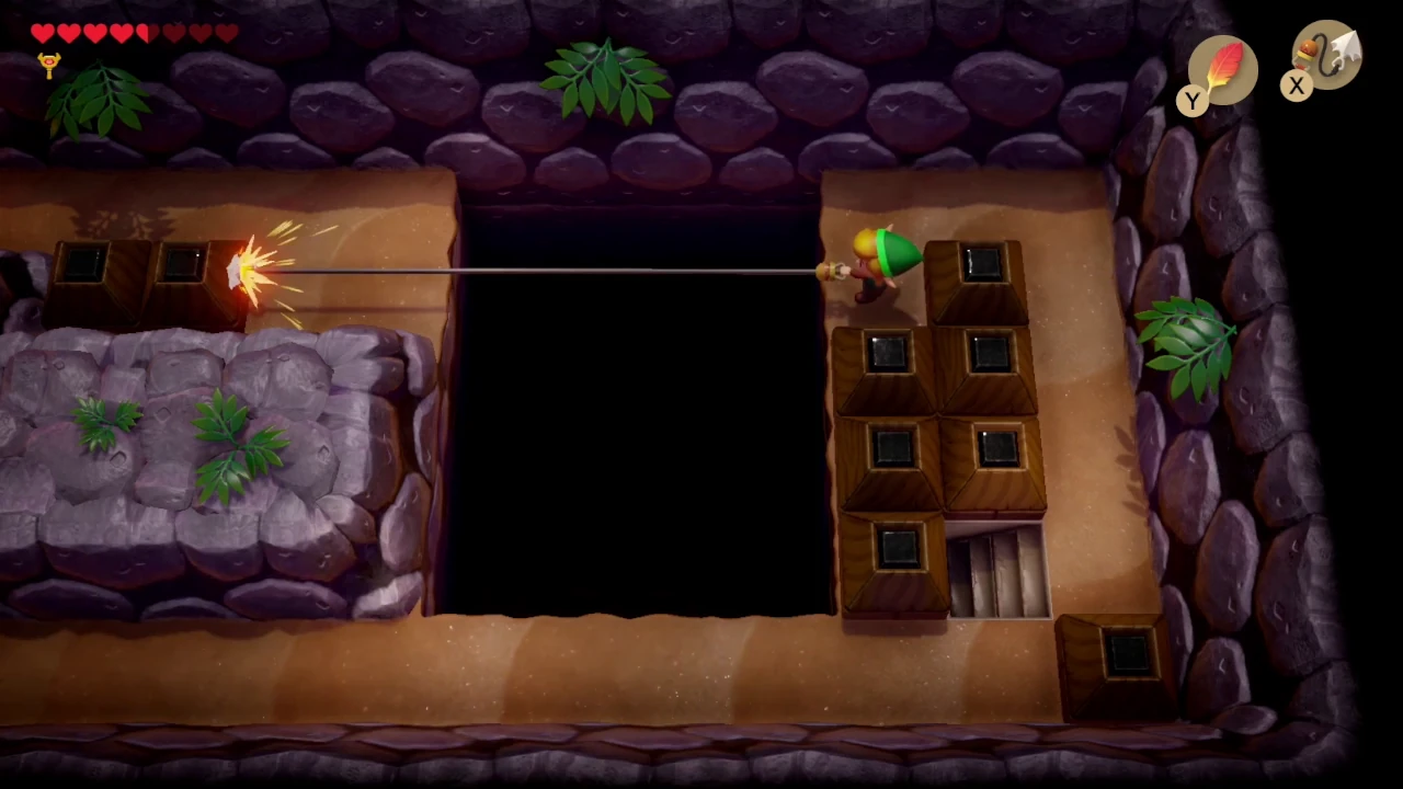 Link using a grappling hook in The Legend Of Zelda: Link's Awakening